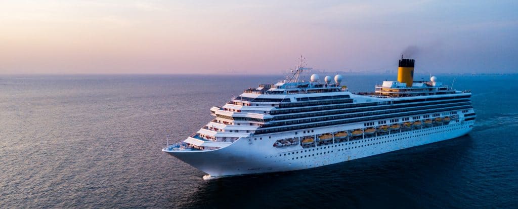 Luxury cruise ship sailing on the ocean, modern vessel for sea travel and vacations.